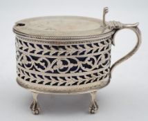 A Victorian silver mustard pot, maker James Deakin & Son, Sheffield, 1888: of oval outline,