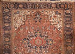 An Heriz carpet:,
