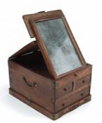 An walnut travelling box: of rectangular outline the hinged lid enclosing a folding mirror plate,