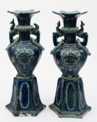 A pair of Chinese fahua vases: decorated in turquoise on a cobalt blue ground,
