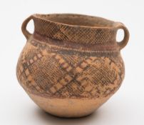 A Neolithic-style painted pottery jar: with globular body and flared neck with two loop handles,