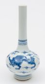 A Chinese porcelain water dropper: of typical footed globular form with raised slender neck painted