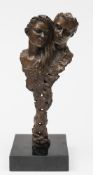 A 20th century bronze: depicting a male and female bust raised on an abstract stem,