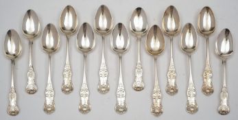 A set of nine Scottish silver Queens pattern teaspoons, maker JM.