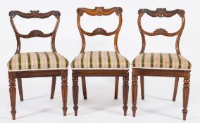 A set of six Regency Colonial carved rosewood dining chairs:,