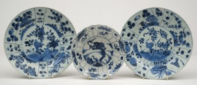 Three blue and white plates: comprising a pair of shallow circular form the centre painted with