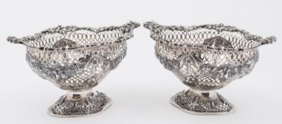 A pair of Edward VII silver oval pierced sweetmeat baskets, maker Goldsmiths & Silversmiths Co.