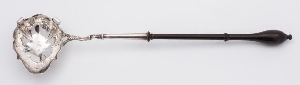 A George II silver punch ladle, maker David Hennell I, London, 1747: crested,