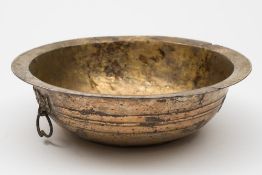 A Chinese gold and silver decorated bronze bowl: with everted rim and taotie mask loose ring