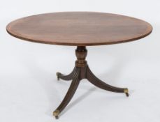 A Regency mahogany oval breakfast table:,