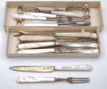 A set of eight George VI mother of pearl and silver fruit knives and forks,maker Roberts & Belk Ltd,