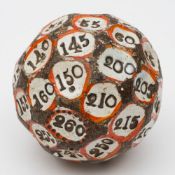A mid 19th century pottery teetotum gambling ball: the multifaceted ball with numbered discs
