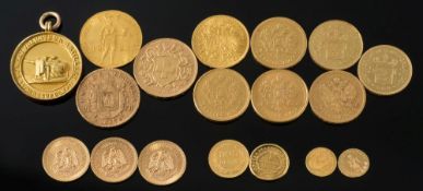 A Swiss twenty francs, sixteen various gold coins and a 15ct gold medallion:.
