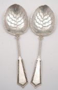 A pair of Victorian Dutch silver serving spoons,