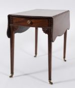 An early 19th Century carved mahogany Pembroke table:, of serpentine outline,