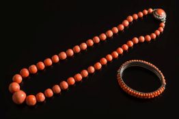 A graduated coral bead,