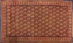 A Khorassan rug:, the shaded field with an all over geometric boteh design,