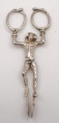A pair of Victorian silver sugar nips: maker's mark worn, London,