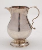 A George II silver sparrow beak cream jug, maker's mark illegible, London,