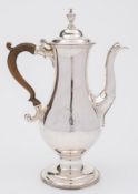 A George III silver coffee pot, maker Charles Wright, London, 1781: monogrammed, of baluster form,