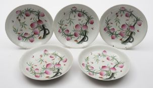 A set of five Chinese famille rose dishes: painted with bats flying amongst fruiting peach branches,