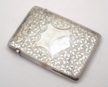 An Edward VII silver card case, maker J.