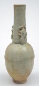 A Chinese Qingbai granary jar: covered with a pale blue/green glaze,