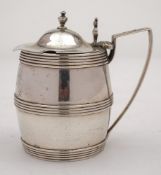 A George III Scottish silver mustard pot, maker James Dempster, Edinburgh, 1804: crested,
