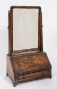 An 18th Century walnut and crossbanded swing frame toilet mirror:,