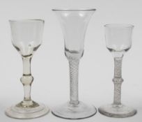 Two English wine glasses and one other: comprising an example with bell shaped bowl set on a
