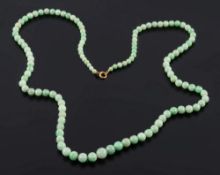A green jade bead single-string necklace: with 117 pale green beads graduated from 4mm to 9.