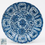A Chinese blue and white dish: with shaped and moulded rim,