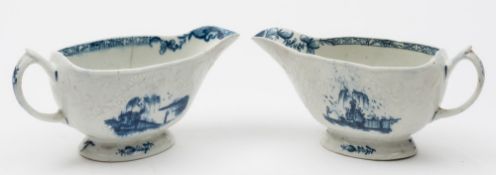 A matched pair of Lowestoft blue and white relief-moulded sauceboats: of Hughes type,