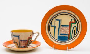 A Clarice Cliff pottery trio in the Tennis pattern: comprising a circular plate and saucer with a