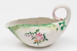 A Derby porcelain cos leaf sauce boat: the handle formed as an upturned stem terminating in a