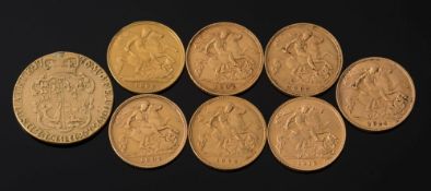 Seven half-sovereigns and a George III guinea:.