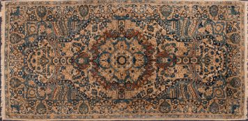 A Tabriz rug:,