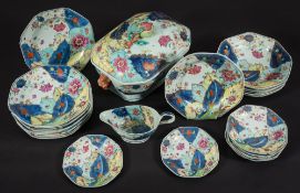 A Chinese Export 'Tobacco Leaf' part dinner service: of octagonal form,
