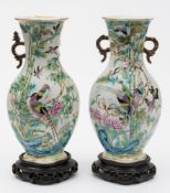 A pair of Chinese famille rose vases: of flattened quadrilobed form,