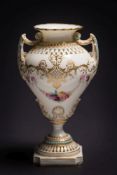 A fine Royal Worcester two-handled reticulated and 'jewelled' vase by George Owen and Harry Chair: