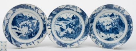 Three Chinese blue and white porcelain plates: each of circular form and painted with similar