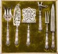 A late 19th/early 20th century French silver and plated six-piece carving/serving set: includes
