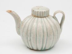 A Chinese pale celadon wine pot and cover: in Song Dynasty style,