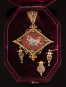 A 19th century Italian gold and micro-mosaic lozenge-shaped pendant/ brooch: the micro-mosaic panel