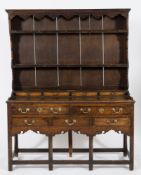 An 18th Century oak dresser:, of small size,