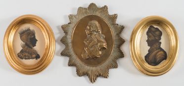 An early 19th Century miniature bronzed silhouette of a lady:-, head and shoulders wearing a turban,