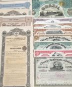 SCRIPHOLOGY : a collection of 15 highly decorative share certificates, various sizes and dates,