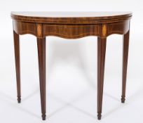An early 19th century mahogany and inlaid half round tea table:,
