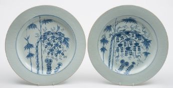 A set of five Chinese blue and white chargers: painted with squirrels amongst bamboo,