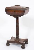 An early Victorian rosewood teapoy:, of sarcophagus shape, the hinged top with carved paterae,